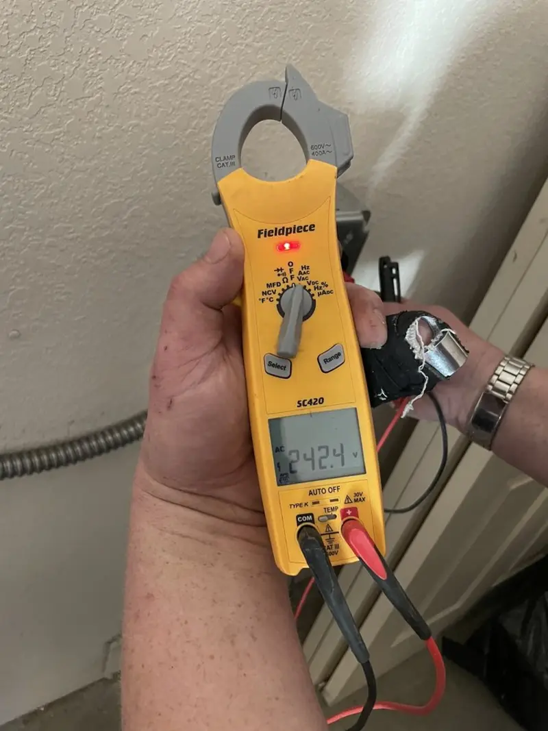 Voltage testing with clamp meter during Generator Installation in Rio Grande City